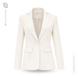 Front view of women's cream blazer with double pocket detail and structured shoulders