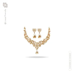 Women's gold tone jewelry set with statement necklace and matching earrings