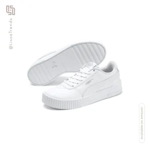 Front view of women's white Puma classic sneakers with brand logo